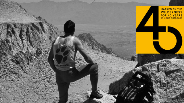 A hiker resting at the summit